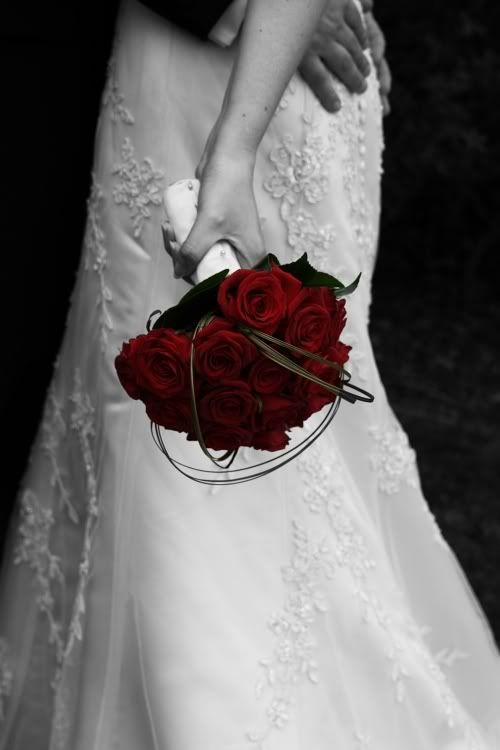 s bride and red roses