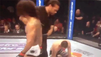 Benson-Henderson-end-of-third-round-with-toothpick-in-his-m.gif