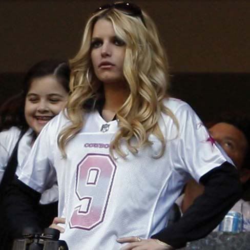  the sight of Jessica Simpson in her pink Tony Romo jersey went well with 